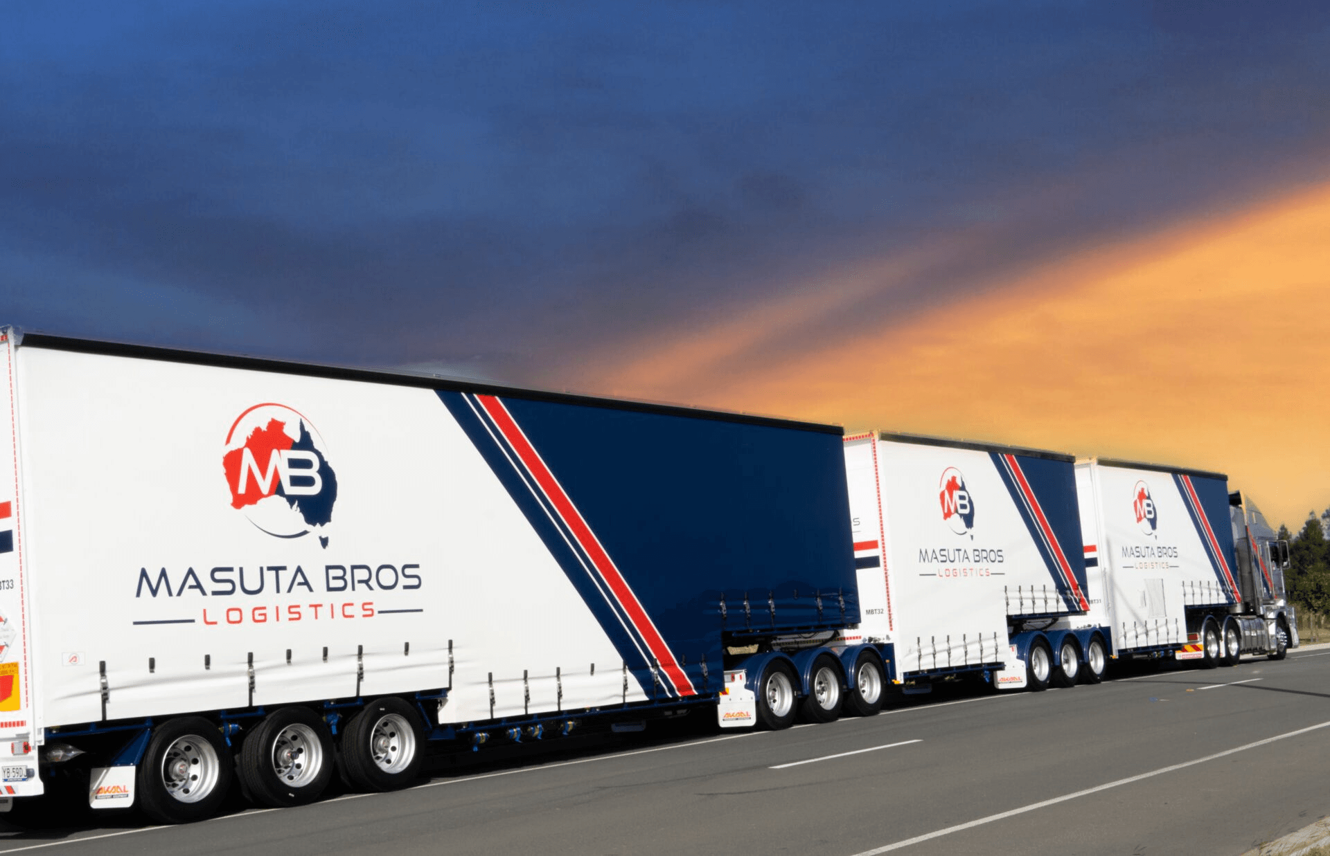 Masuta Bros Logistics B-double trailers at sunset